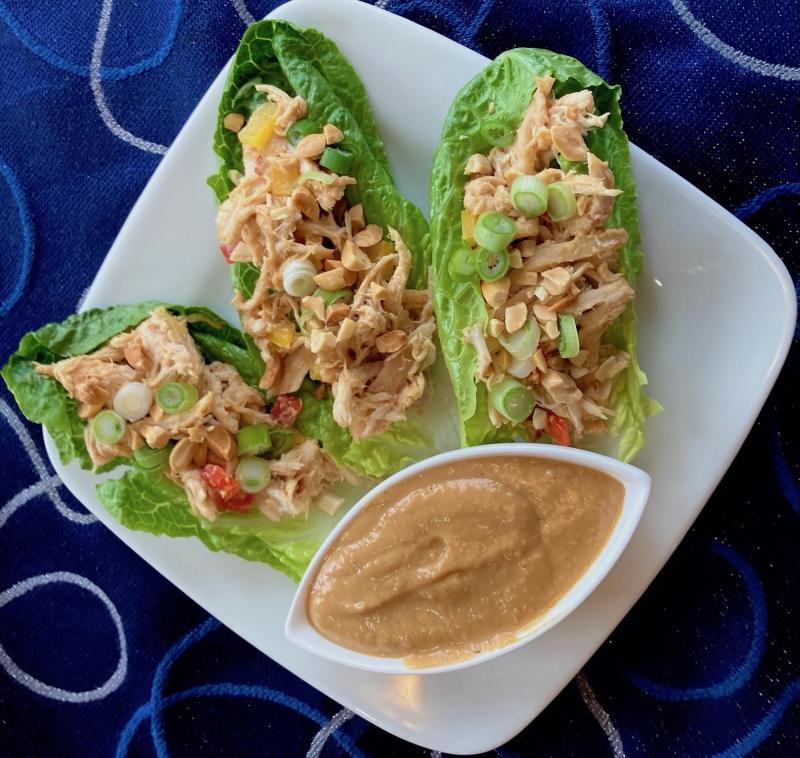 These tasty lettuce wraps contain shredded chicken combined with a spicy peanut sauce, plus extra for dipping. JACK CLEMONS PHOTO